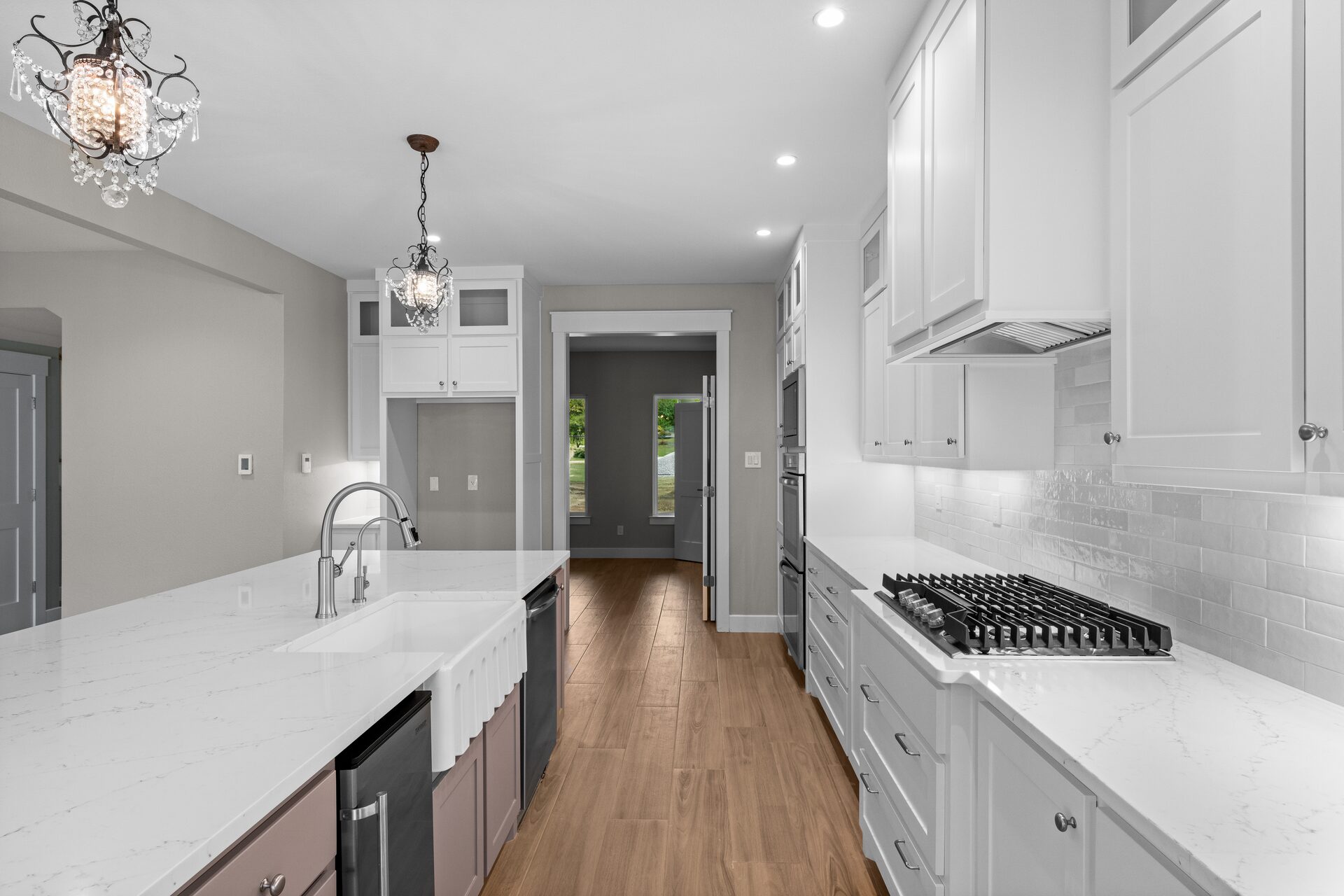 Post Oak custom home open floor plan kitchen and living area by RBCS Inc in North Texas